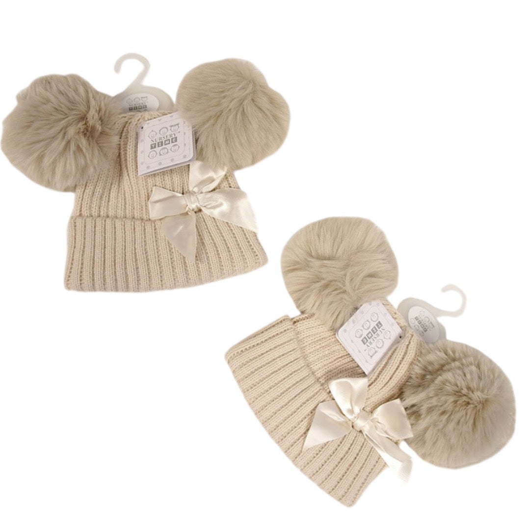 BEIGE CABLE KNIT HAT WITH BOW & 2 LARGE FUR POM PO